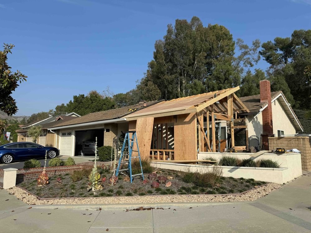 Garage conversion framing in progress by Busy Bee Construction Solutions